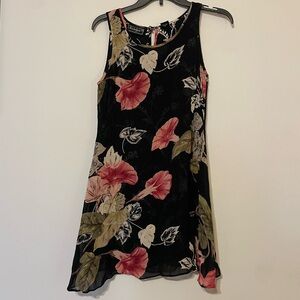 Reversible black and floral mini dress with pink accents